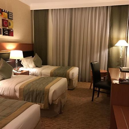 Al Ansar Golden Tulip Hotel Medina Bagian luar foto