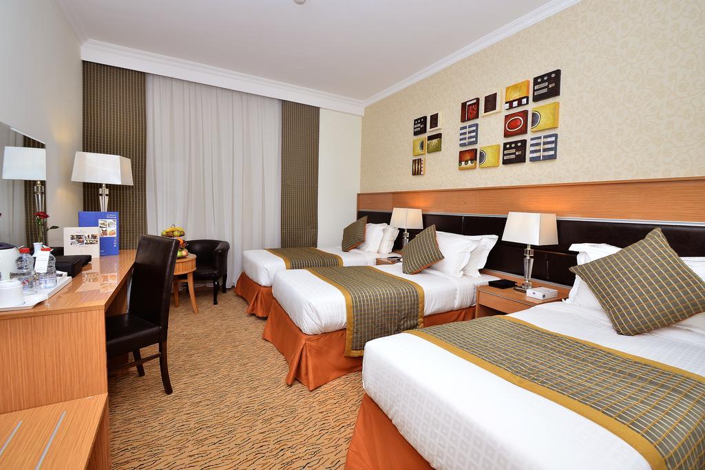 Al Ansar Golden Tulip Hotel Medina Bagian luar foto