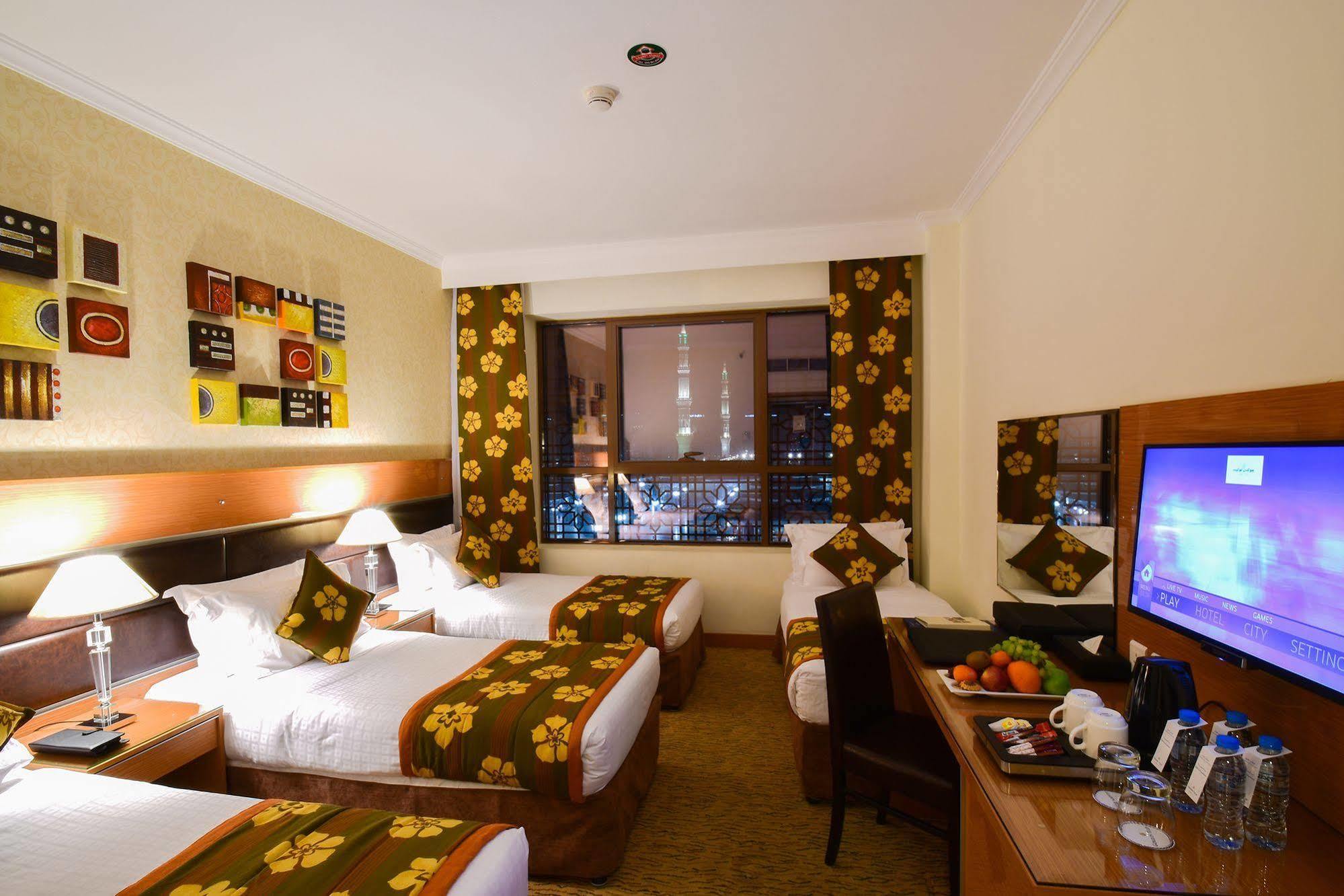 Al Ansar Golden Tulip Hotel Medina Bagian luar foto