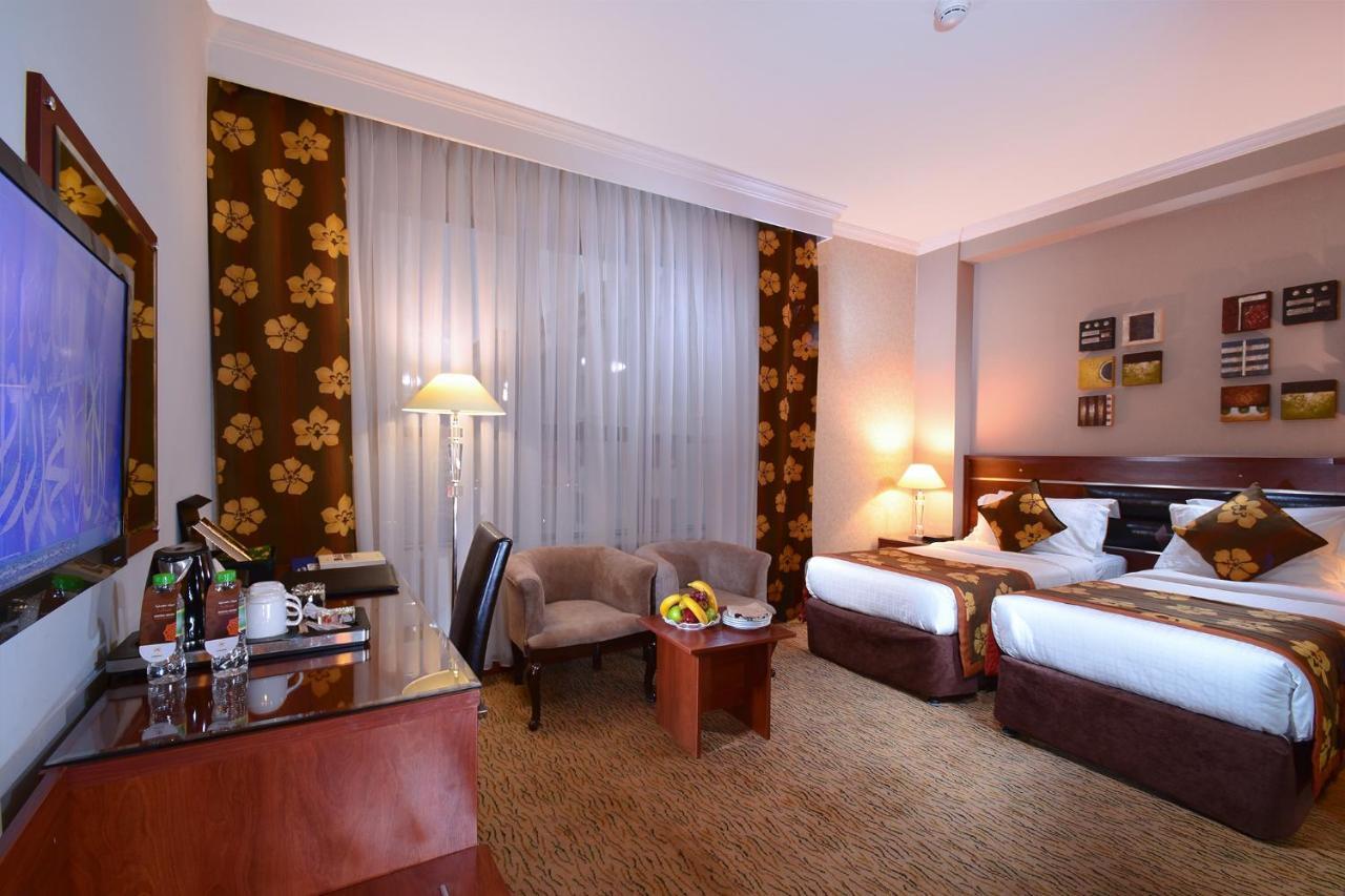 Al Ansar Golden Tulip Hotel Medina Bagian luar foto