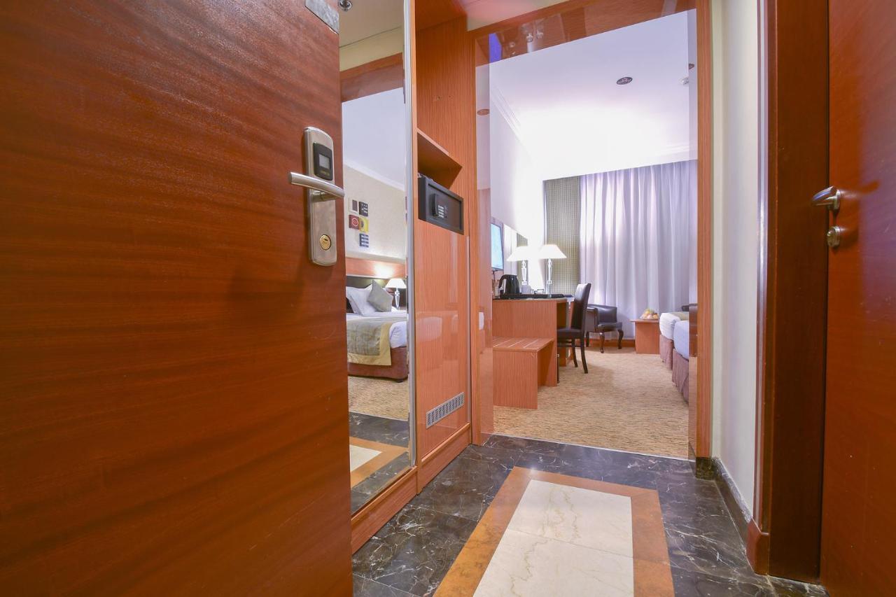 Al Ansar Golden Tulip Hotel Medina Bagian luar foto