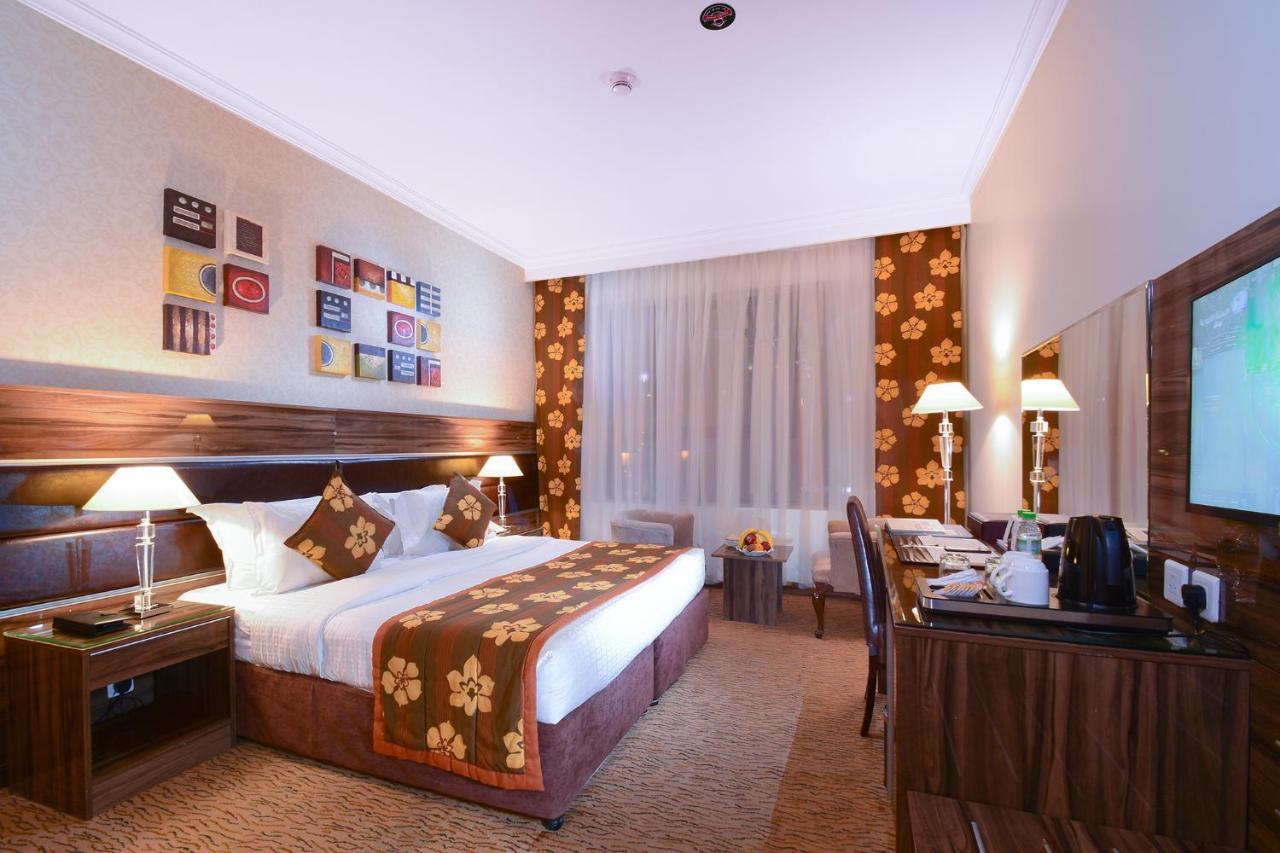 Al Ansar Golden Tulip Hotel Medina Bagian luar foto